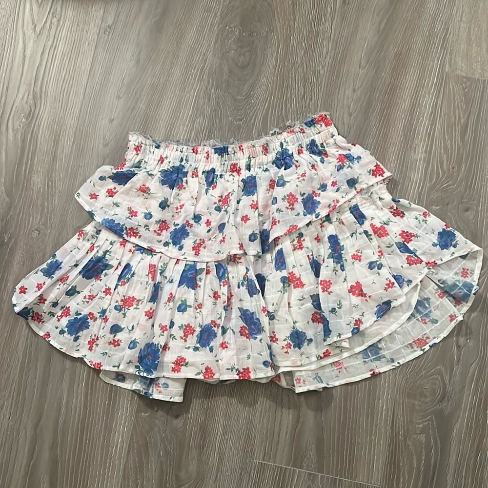Loveshackfancy ruffled white skirt with blue and red flowers